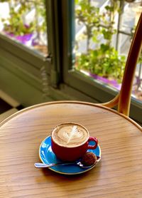 Coffee cup on table