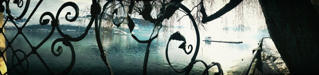 water, transportation, nautical vessel, mode of transport, close-up, reflection, outdoors, boat, day, no people, rope, sea, graffiti, lake, part of, nature, bicycle, river, sky, creativity