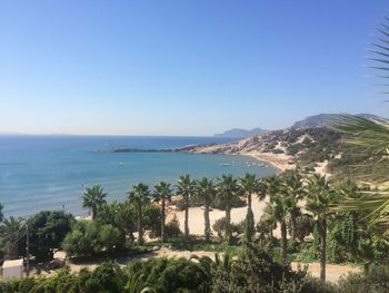 Scenic view of sea against clear blue sky