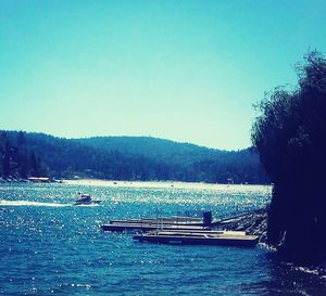 Scenic view of calm lake against clear sky