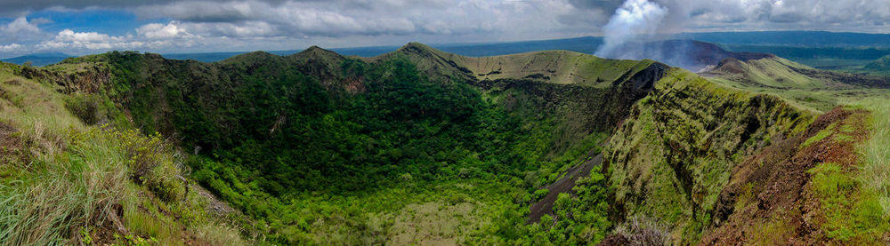 Panoramic view of landscape and mountains against sky