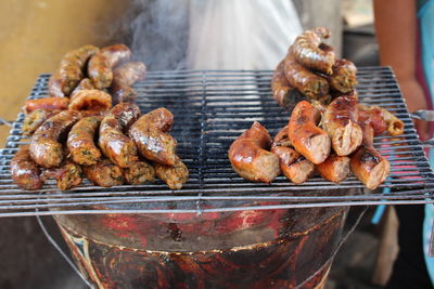 Close-up of meat on barbecue grill