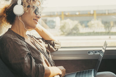 Young woman using mobile phone