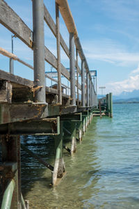 Pier over sea against sky