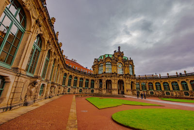View of historic building against cloudy sky