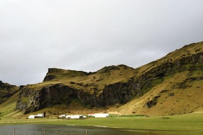 Landscape with mountain range in background