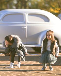 Two cute asian girls outdoors