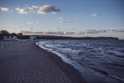 Scenic view of sea against cloudy sky