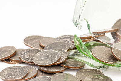 High angle view of coins on table