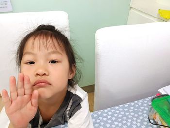 Portrait of cute girl at home