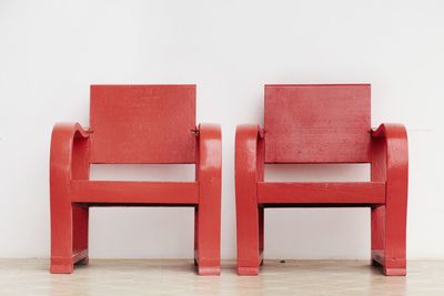 Close-up of empty chair against white background