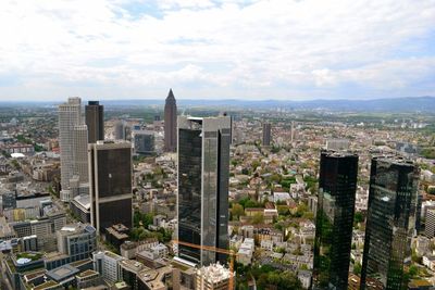 High angle shot of cityscape against sky