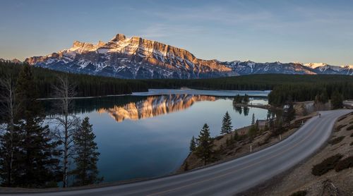 Scenic reflection of rocky mountain in lake