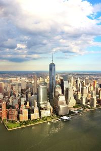 City skyline against cloudy sky