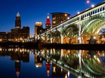 Reflection of illuminated buildings in water at night