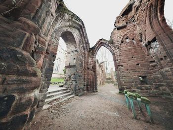 Low angle view of old ruins against sky