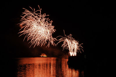 Firework display at night