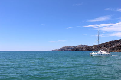 Boat sailing in sea