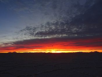 Scenic view of dramatic sky during sunset