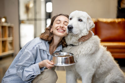 Portrait of woman with dog