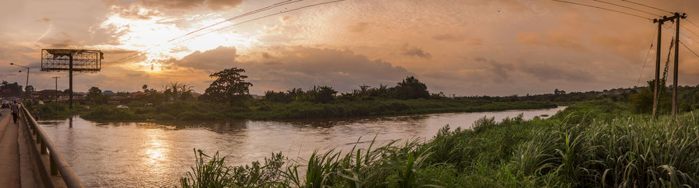 Panoramic view of lake against sky during sunset