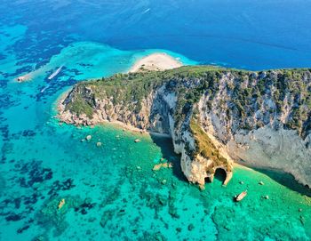 High angle view of rocks by sea