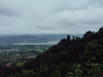 High angle view of city by sea