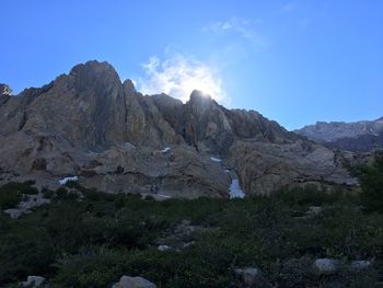 Scenic view of rocky mountains against sky