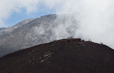 Panoramic view of volcanic mountain against sky