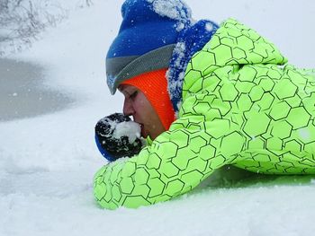 Close-up of woman covering face