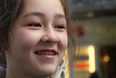 Close-up of smiling teenage girl