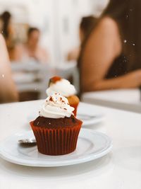 Close-up of cupcakes on table