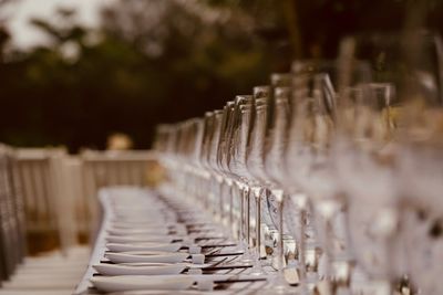 Close-up of chairs in row