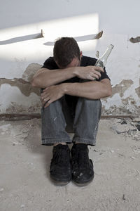 Man sitting on floor