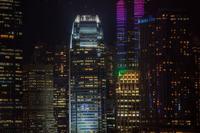 Illuminated buildings in city at night