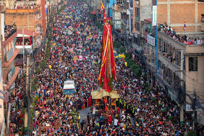 Devotees pull chariots as they take part in the festivities to mark the rato machindranath chariot.