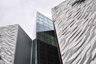 Low angle view of modern buildings against sky