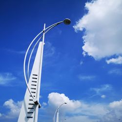 Low angle view of street light against sky