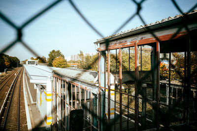 Train on railroad track against sky