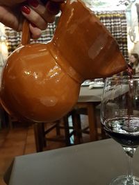 Close-up of beer glass on table at restaurant