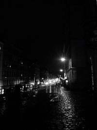 Illuminated street lights at night