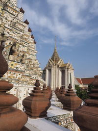 View of temple against building