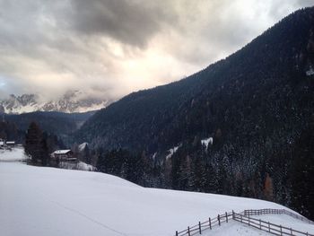 Scenic view of mountains against sky during winter