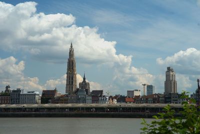 Buildings in city against sky