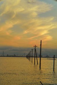 Scenic view of sea against sky at sunset