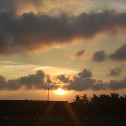 Scenic view of dramatic sky during sunset