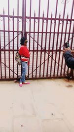 Boy playing with umbrella