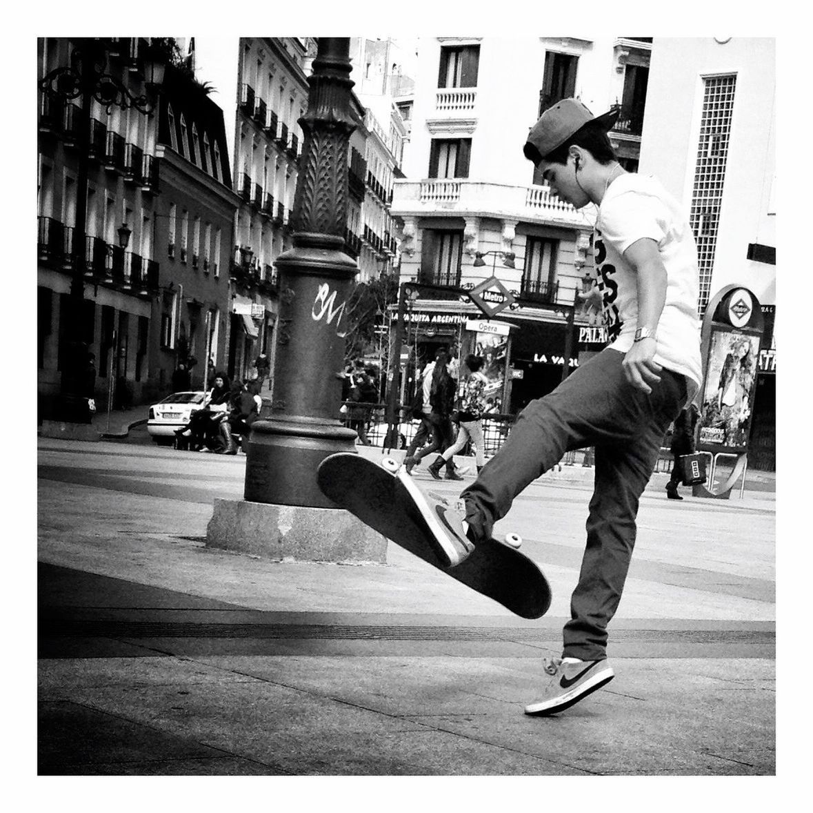 full length, transfer print, lifestyles, building exterior, auto post production filter, leisure activity, architecture, street, built structure, casual clothing, childhood, city, person, mid-air, playing, jumping, city life, young adult