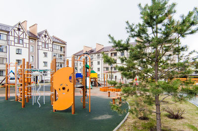 View of playground against buildings