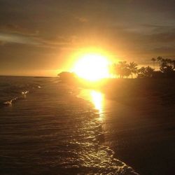 Scenic view of sea at sunset